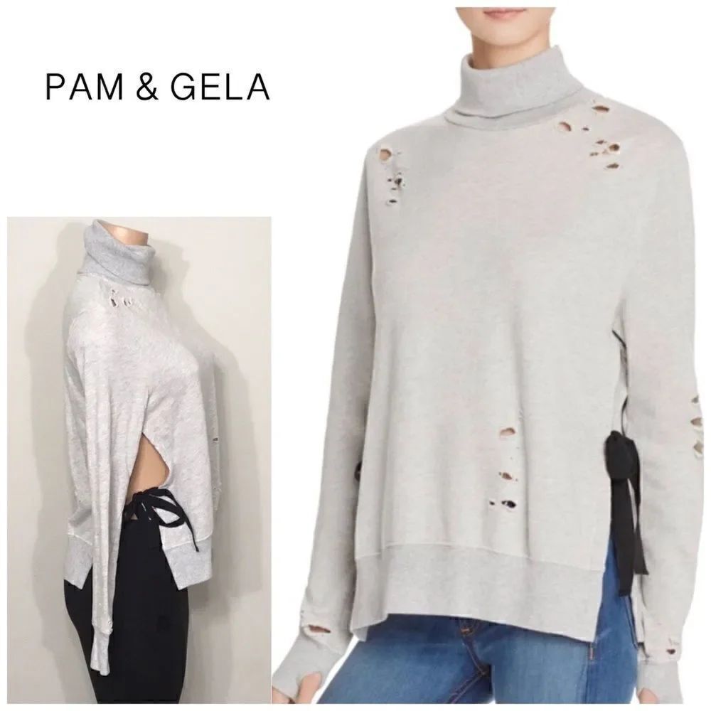 PAM & GELA side split destroyed sweatshirt. NWOT